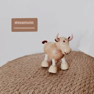 Đồ chơi mô phỏng con bò bằng gỗ